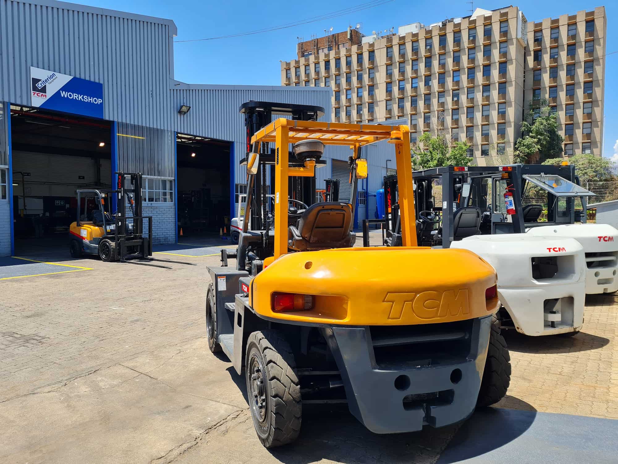 TCM forklifts South Africa at Criterion Equipment workshop with diesel and electric forklift models ready for sale and hire