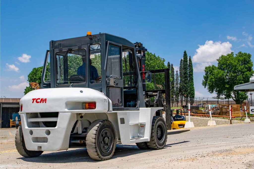 TCM diesel forklift heavy-duty industrial model parked outdoors